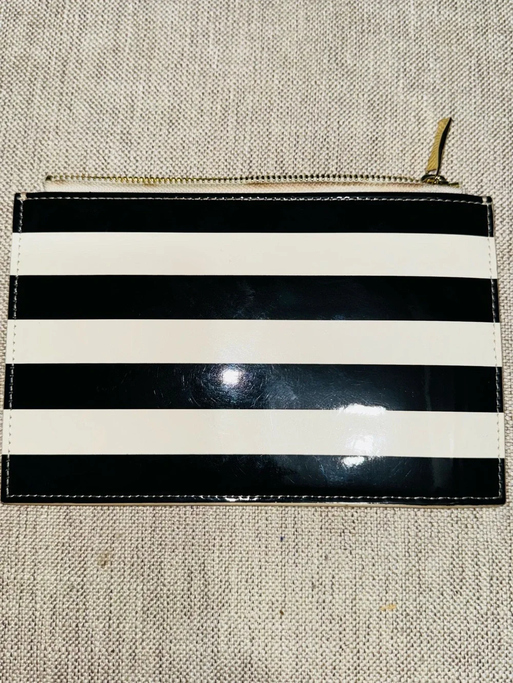 kate spade Black and White Striped Patent Zip Pouch